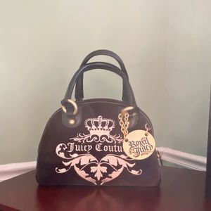 Juicy Couture black and gold handbag.